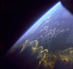 Image of Earth from space, viewing atmosphere at an angle.